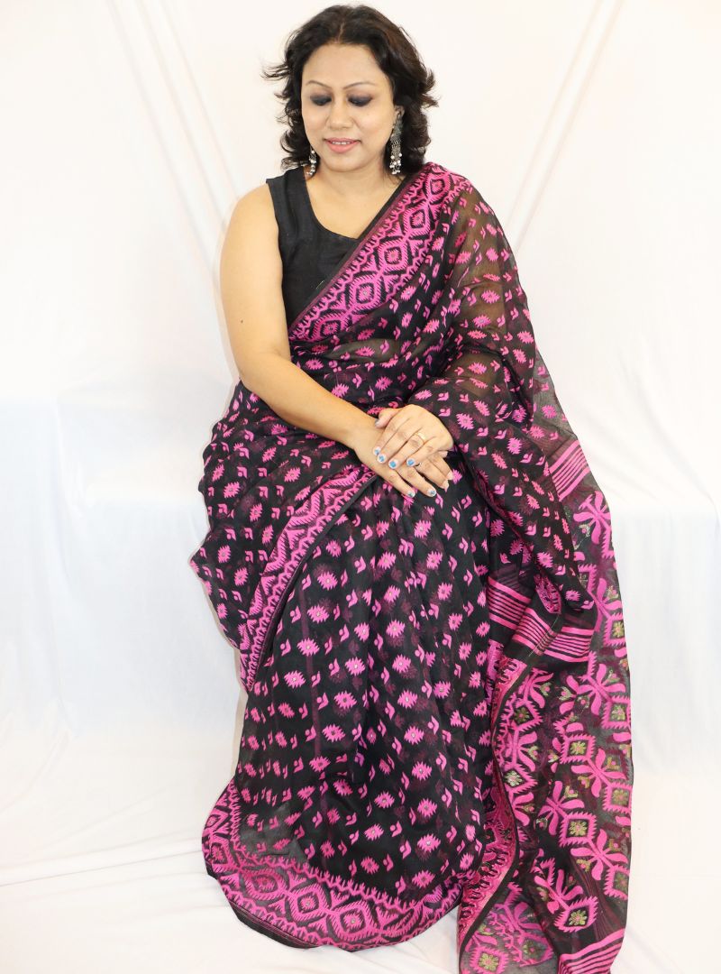 PASTEL PINK CLASSIC COCKTAIL SAREE WITH ALL OVER BLACK SEQUINS PAIRED WITH  A BLACK SEQUINNED BLOUSE AND BORDER. - Seasons India